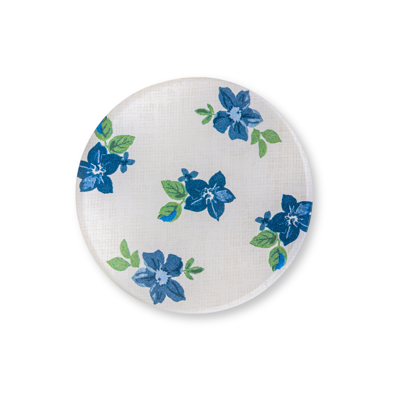 Blue and white floral coaster from Nathan Turner Interiors and Proper Table Co. collection.