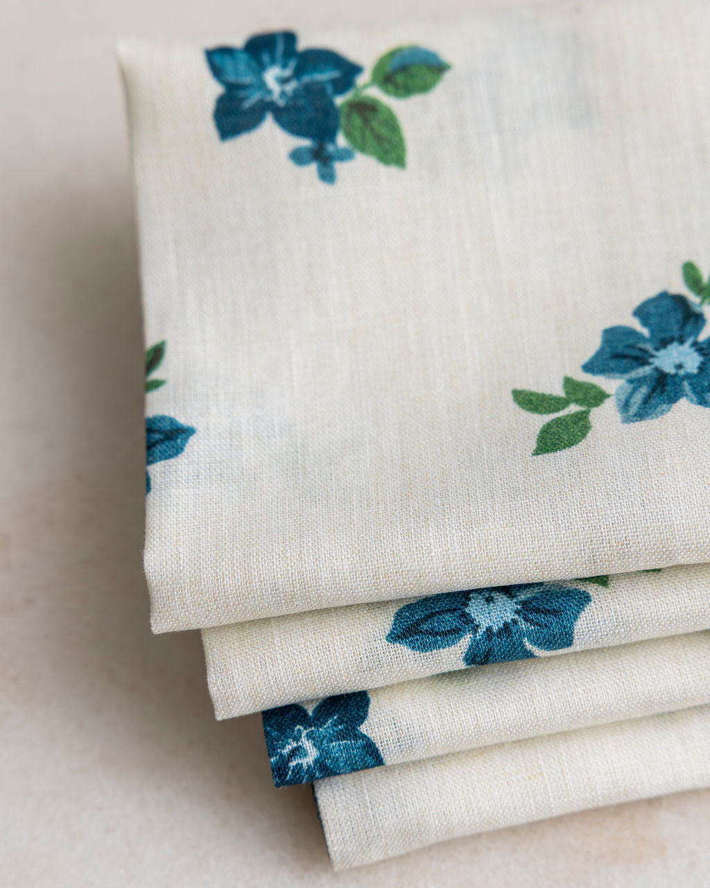 
                  
                    Stack of Nathan Turner x Proper Table Anna napkins on marble table. 
                  
                