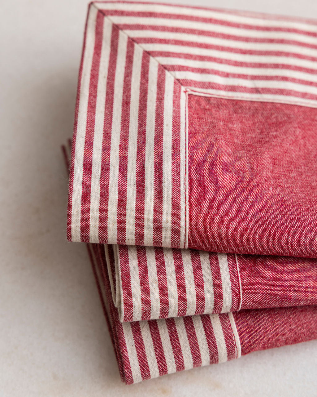 
                  
                    Proper Table hot pink and white striped fabric on a light background
                  
                