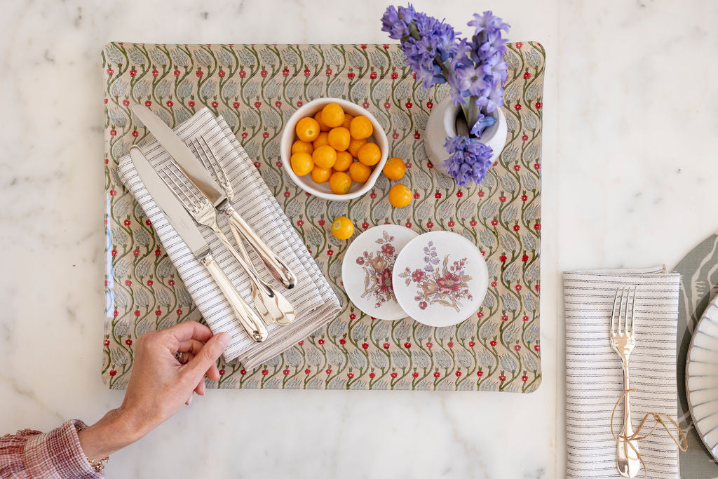
                  
                    Adelaide floral acrylic tray styled as a breakfast tray with floral coasters, ticking stripe napkin, kumquats and fresh flowers
                  
                